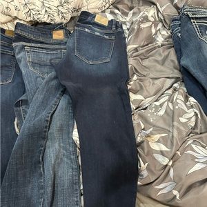 Three pairs, American Eagle, jeans, one pair of BKE